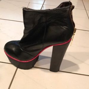 AWESOME black pump heel boot.